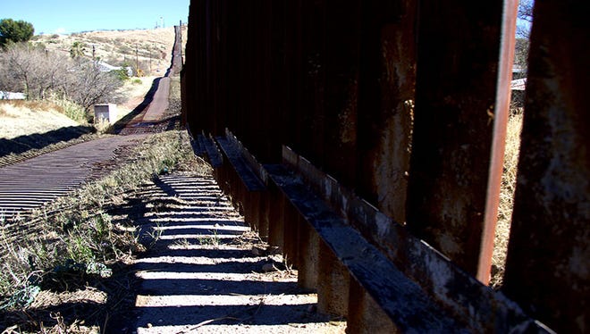 A close-up of the U.S. and Mexico border wall in Nogales on Jan. 25, 2017.