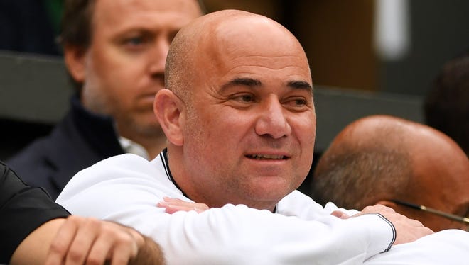 Andre Agassi, coach of Novak Djokovic, looks on during Djokovic's Round of 16 match.
