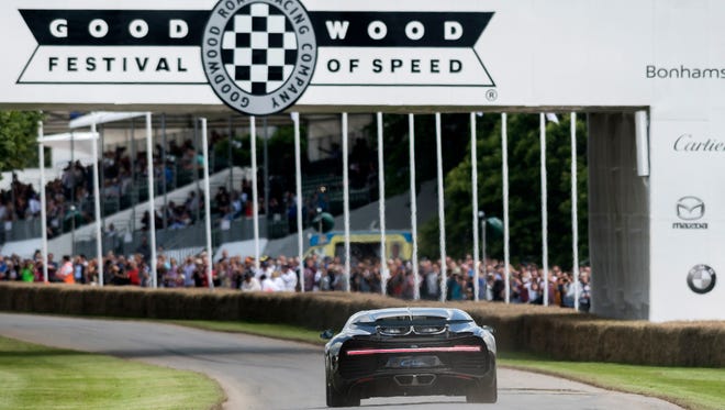 The Bugatti Chiron drives on the track of the Goodwood Festival of Speed.