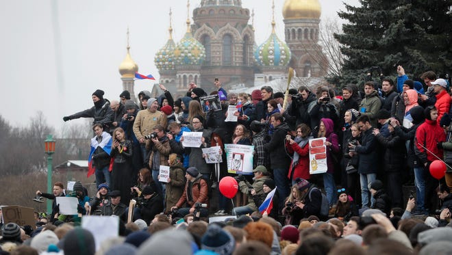 Protesters gather at Marsivo Field in St. Petersburg, Russia on March 26, 2017 as part of an unsanctioned protest against the Russian government, the biggest gathering in a wave of nationwide protests that were the most extensive show of defiance in years.