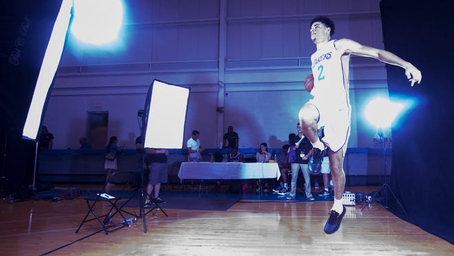 Los Angeles Lakers' Lonzo Ball poses for the cameras.