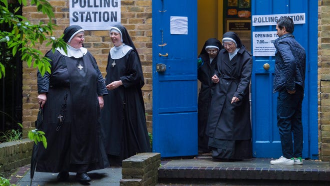 Nuns leave a polling station after voting in the EU Referendum in London. Britons voted on whether to remain in or leave the European Union in a referendum on 23 June.