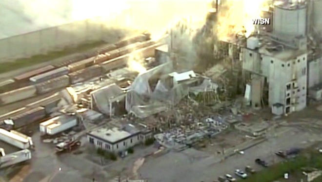 In this image taken from a video by WISN-TV, the rubble of a corn mill plant following an explosion is seen, Thursday, June 1, 2017, in Cambria, Wis. The sheriff in Columbia County said that the blast was reported around 11 p.m. Wednesday at the Didion Milling Plant in Cambria, about 80 miles northwest of Milwaukee. (WISN-TV via AP)