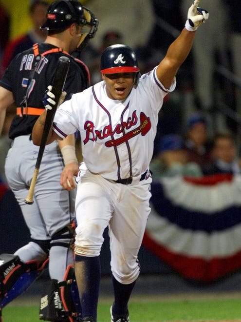 Andruw Jones walked to drive in the winning run in Game 6 of the 1999 NLCS against the Mets, sending the Braves to the World Series.
