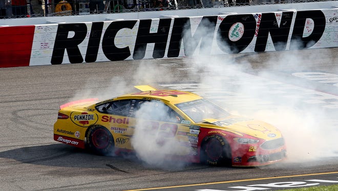 Joey Logano performs a burnout after winning the 2017 Toyota Owners 400 at Richmond International Raceway. Logano was penalized post-race, however, so he could not use the victory to clinch a berth in the playoffs.