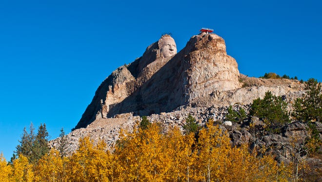 South Dakota: If you're headed to South Dakota to see Mount Rushmore, plan a few extra days in your schedule to explore nearby bucket list sights. An even larger memorial is emerging from the hills in Crazy Horse, S.D. Begun by the same sculptor as the famous mountain of presidential faces, the Crazy Horse Memorial ($28 per car), a still-in-progress tribute to the local Lakota Indians, has been a work in progress since 1948. When it's completed, it will be the world's largest mountain carving at 563 feet tall. The head of the Crazy Horse statue is 27 feet taller in size than the heads of Mount Rushmore. Afterward, head to Rapid City to see more American presidents. Look for life-size bronze statues along city sidewalks in downtown.