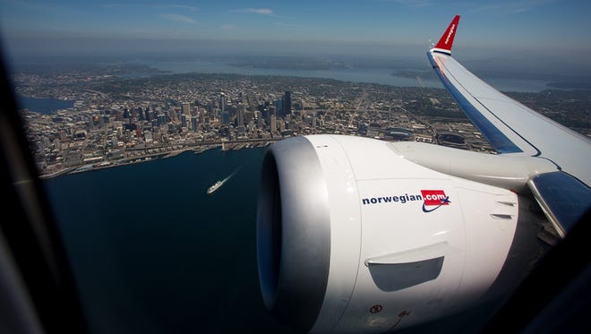 Norwegian Air's first Boeing 737 MAX 8 jet flies over Seattle, Washington on its delivery flight to Oslo, Norway on June 29, 2017.