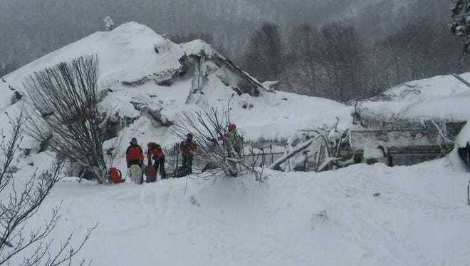 Rescue continues at hotel Rigopiano after it was hit by an avalanche in Farindola Italy Jan. 19, 2017.