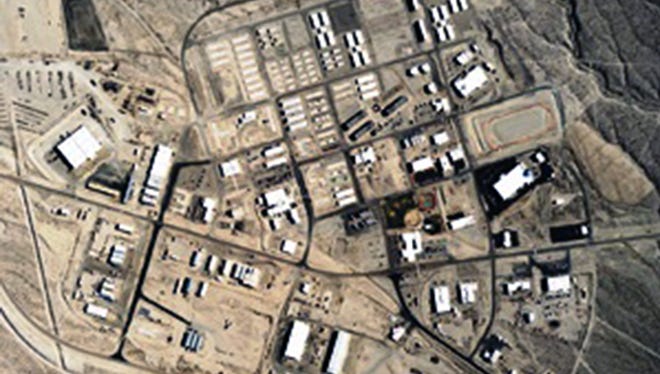 The Nevada National Security Site, created in 1951 as the Nevada Proving Grounds, encompasses more than 1,250 square miles in southern Nevada and was used to test atomic bombs. This satellite view, taken July 30, 2012, shows Mercury, Nev., a town at its peak in the 1950s inside the closed-to-the-public site.