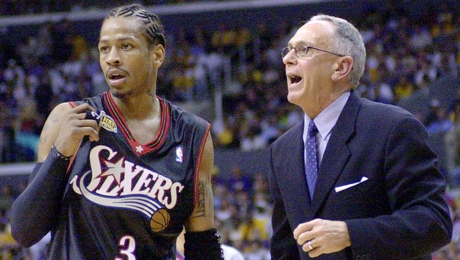 76ers head coach Larry Brown gives instructions to Allen Iverson during the first half of Game 1 of the NBA Finals against the Los Angeles Lakers.