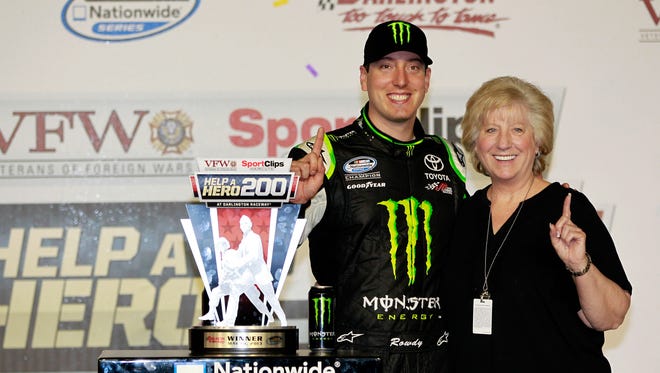 Busch celebrates in victory lane with his mother, Gaye, after winning the Nationwide race at Darlington Raceway on May 10, 2013.