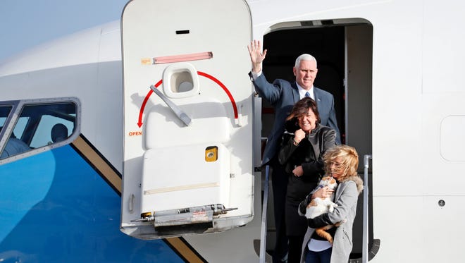 The Pence family steps off an Air Force plane, similar to the one Pence will use after being sworn in, at Andrews Air Force Base, Md., on Jan. 9, 2017.