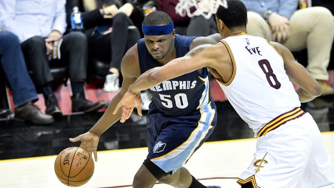 Dec 13, 2016; Cleveland, OH, USA; Memphis Grizzlies forward Zach Randolph (50) drives against Cleveland Cavaliers forward Channing Frye (8) in the second quarter at Quicken Loans Arena. Mandatory Credit: David Richard-USA TODAY Sports