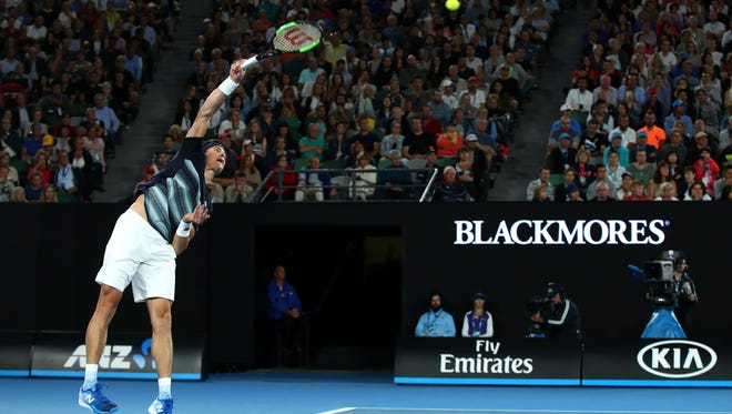 Milos Raonic serves in his quarterfinal match against Rafael Nadal on Jan. 25.