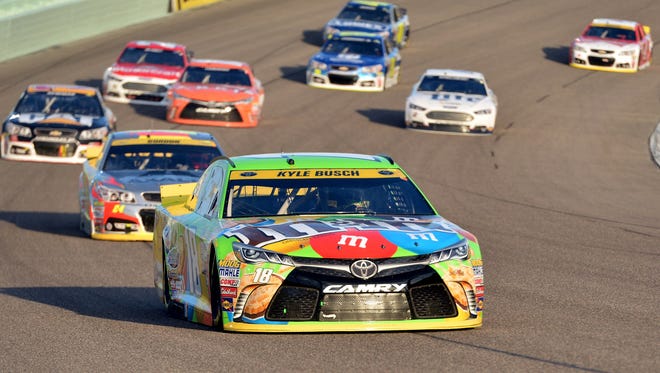 Busch leads the pack during the Ford EcoBoost 400 at Homestead-Miami Speedway on Nov. 22, 2015.