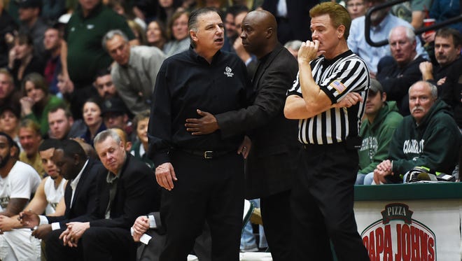 CSU coach Larry Eustachy speaks to the referee Jan. 7, 2015 at Moby Arena. He was later issued a technical foul.