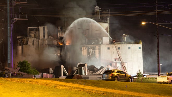 This Thursday, June 1, 2017, photo provided by Jeff Lange shows the scene following a fatal explosion and fire at the Didion Milling plant in Cambria, Wis. Recovery crews searched a mountain of debris on Thursday following a fatal explosion late Wednesday at the corn mill plant, which injured about a dozen people and leveled parts of the sprawling facility in southern Wisconsin, authorities said.
