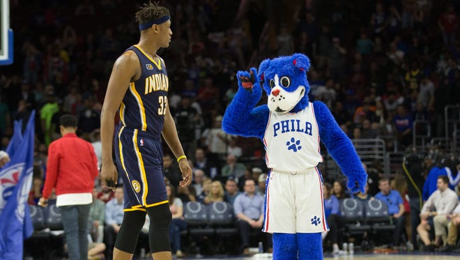 Apr 10: Philadelphia 76ers mascot Franklin reacts with Indiana Pacers center Myles Turner (33) during the second half at Wells Fargo Center.