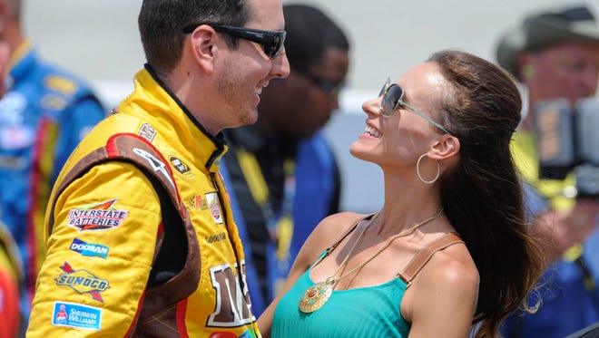 Kyle Busch and his wife Samantha, shown in 2013 at Dover International Speedway, married in Chicago on Dec 31, 2010.