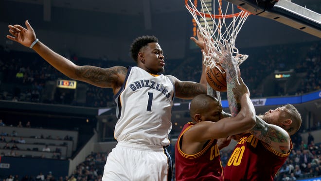 Memphis Grizzlies Jarell Martin gets in a tangle with James Jones and Chris Andersen Cleveland Cavaliers.