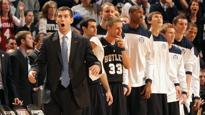 Butler's head coach Brad Stevens questions a call in the second half of their game.The Bulldogs defeated the Hoosiers 88-86 in overtime of their 2012 Crossroads Classic game at Bankers Life Fieldhouse.  Matt Kryger / The Star
