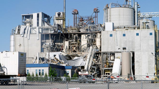 The destruction left after a May 31 explosion at the corn mill plant at the Didion Milling complex greets drivers along Highway 146 by Cambria. Three workers died in the explosion. Two other workers died in the hospital.