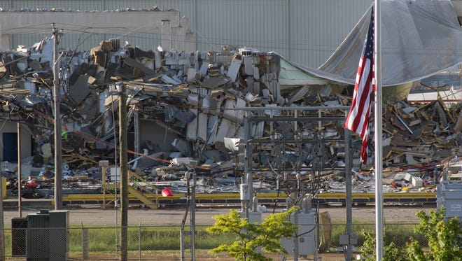 The destruction left after a May 31 explosion at the corn mill plant at Didion Milling greets drivers heading north on Highway 146 by Cambria. Three workers died in the explosion. Two other workers died in the hospital from injuries sustained in the explosion.