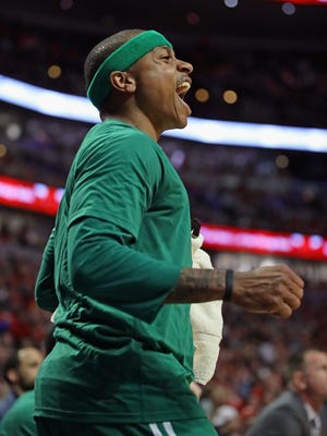 Isaiah Thomas of the Boston Celtics encourages his teammates against the Chicago Bulls during Game 3 of the Eastern Conference quarterfinals.