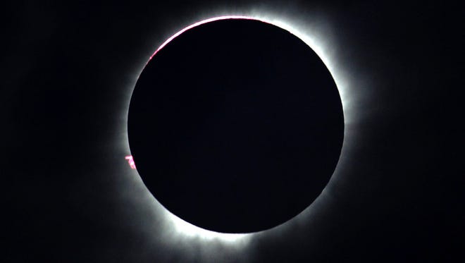 A total solar eclipse is seen in Ternate, Maluku Islands, Indonesia, on March 9.