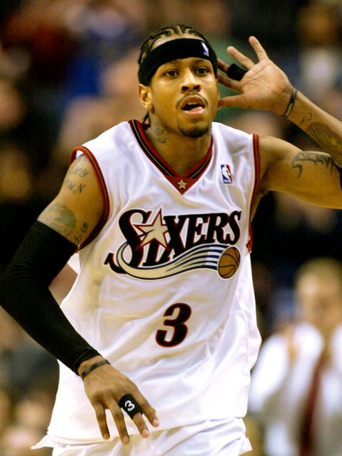 Allen Iverson calls for crowd noise during the final minutes of a 76ers 96-93 win over the Indiana Pacers.