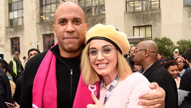 New Jersey Sen. Cory Booker and Katy Perry attend the rally at the Women's March on Washington.
