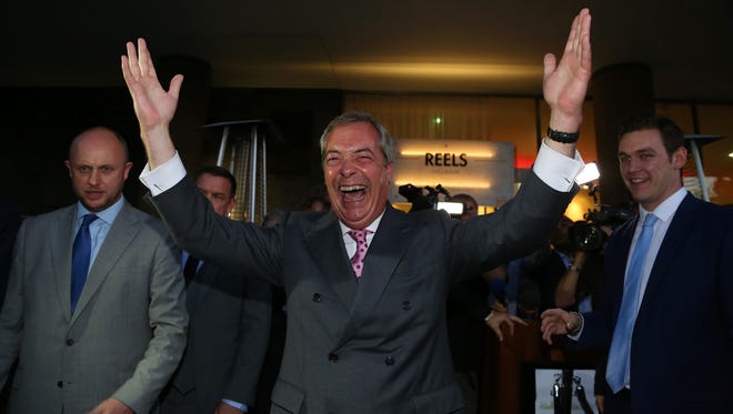 Leader of the United Kingdom Independence Party, or UKIP, Nigel Farage reacts outside the Leave EU referendum party at Millbank Tower in central London on June 24, 2016.