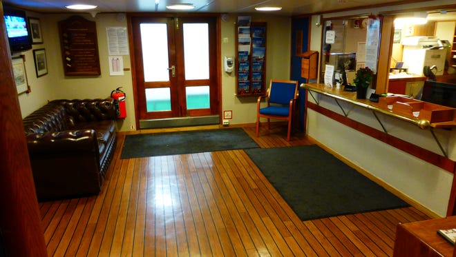 The entry hall and reception are on midships Promenade Deck.