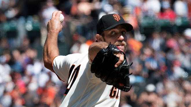 Madison Bumgarner is 14-9 with a 2.57 ERA with the Giants.
