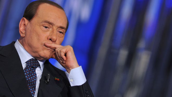 Former Italian prime minister Silvio Berlusconi attends a TV show in Rome on April 24, 2014.