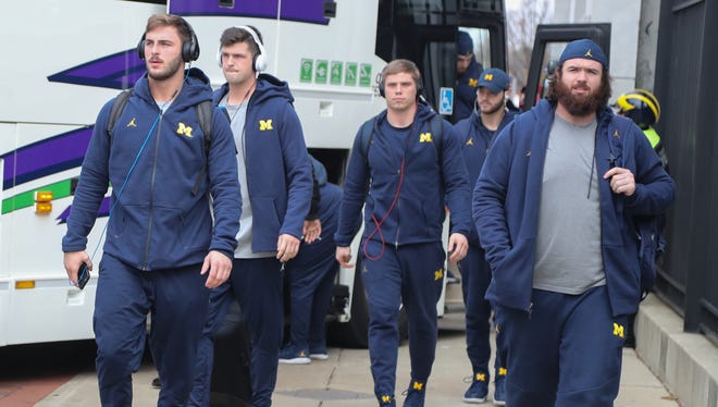 Michigan players arrive for the game against Ohio State on Saturday, November 26, 2016 at Ohio Stadium in Columbus.