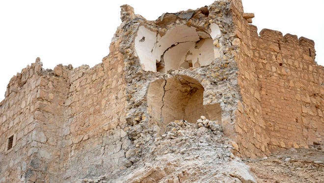 Damage to the Palmyra citadel following fighting between government forces and Islamic State militants in Palmyra, Syria, on March 27, 2016.