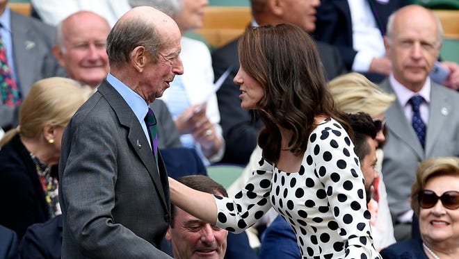 Kate Middleton, the Duchess of Cambridge, and Prince Edward, Duke of Kent, arrive at the Centre Court for a first round match at the Wimbledon Championships.