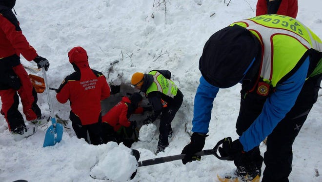 Rescue operations continue at the hotel Rigopiano after it was hit by an avalanche in Farindola Abruzzo region of Italy Jan 19, 2017. Rescue workers in the central Italian region of Abruzzo, fearful about plummeting night time temperatures, were in a race against time Friday searching for survivors Thursday after an avalanche of snow, ice and mud flattened a resort hotel with up to 30 guests and staff members insi