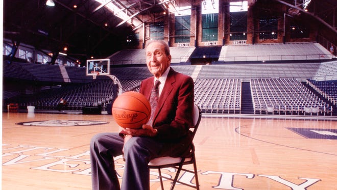 Tony Hinkle sits in Hinkle Fieldhouse named in his honor