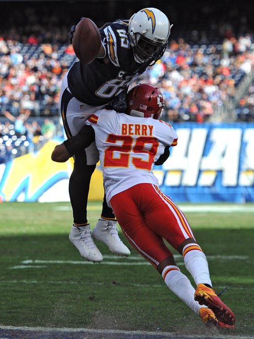 Chargers tight end Antonio Gates (85) reaches the ball over the goal line for a touchdown during the first half against the Chiefs.