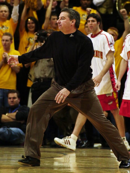 Iowa State head coach Larry Eustachy storms the court after his team's 76-73 loss to Missouri Wednesday, Feb. 6, 2002, in Columbia, Mo.