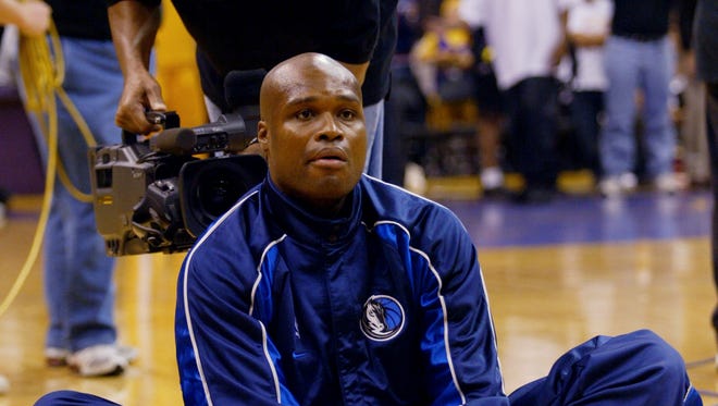 2003: Antoine Walker stretches before a game against the Los Angeles Lakers.