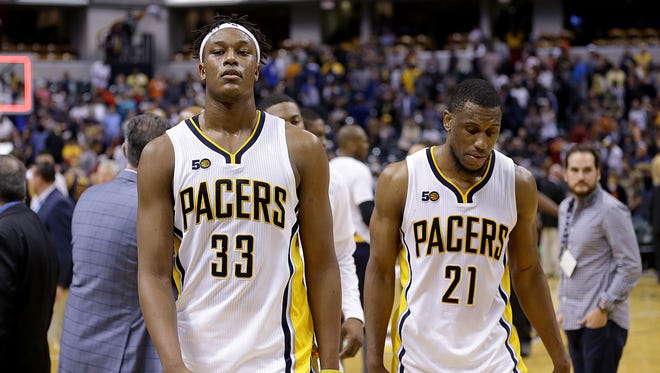 Indiana Pacers Myles Turner (33) and Thaddeus Young (21) walk off the court after the Pacers lost to the Cleveland Cavaliers Sunday, April 23, 2017, afternoon at Bankers Life Fieldhouse. The Pacers lost to the Cavaliers 106-102.