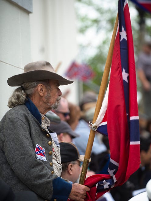 A man looks on during a Confederate Memorial Day service outside the Alabama Capitol on Monday, April 24, 2017, in Montgomery, Ala.