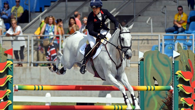 Pippa Funnell of Great Britain rides Billy the Biz during equestrian eventing jumping in the Rio 2016 Summer Olympic Games at Olympic Equestrian Centre.