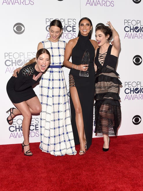 LOS ANGELES, CA - JANUARY 06:  (L-R) Actors Ashley Benson, Troian Bellisario, Shay Mitchell and Lucy Hale, winners of Favorite Cable TV Drama for "Pretty Little Liars", pose in the press room during the People's Choice Awards 2016 at Microsoft Theater on January 6, 2016 in Los Angeles, California.  (Photo by Jason Merritt/Getty Images) ORG XMIT: 597074345 [Via MerlinFTP Drop]