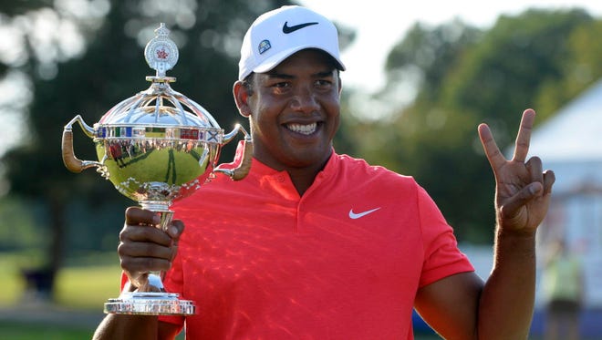 July 30, 2017; Oakville, Ontario, CAN; Jhonattan Vegas poses with the trophy after winning the RBC Canadian Open golf tournament at Glen Abbey Golf Club. Mandatory Credit: Eric Bolte-USA TODAY Sports ORG XMIT: USATSI-327694 ORIG FILE ID:  20170730_jla_bb5_052.jpg