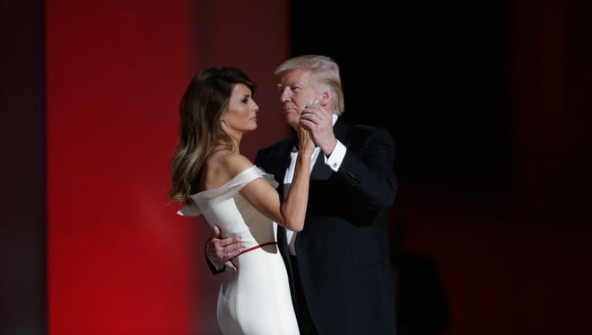 President Donald Trump dances with his wife Melania Trump at the Liberty Inaugural Ball in Washington.