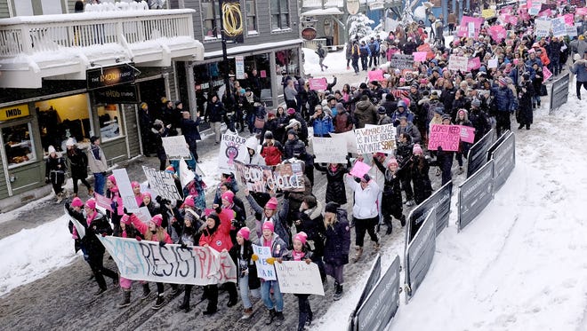 Marchers participate in the Women's March on Main Street Park City, Saturday.